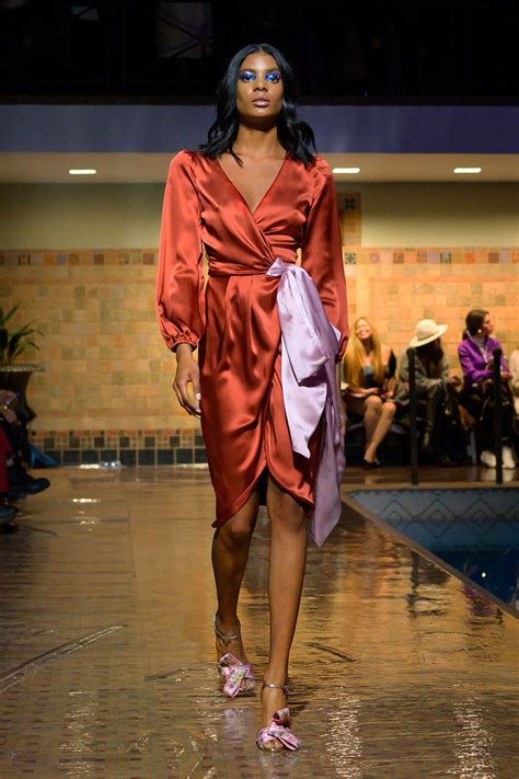 Cynthia Rowley Fall 2019 look 12 featuring an orange silk wrap dress ...
