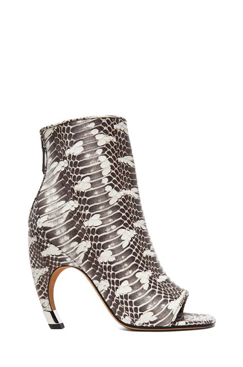 Givenchy Eclisi Curved Heel Snakeskin Embossed Leather Booties in ...