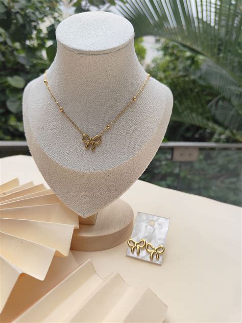 Buy Liora Bowset: 18k Gold-plated Bow Necklace & Earrings | Water ...