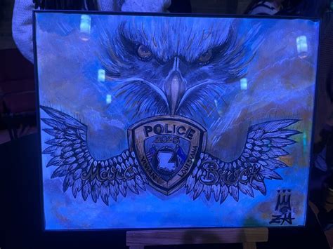 Memorial artists honor fallen Officer Marc Brock with tribute paintings