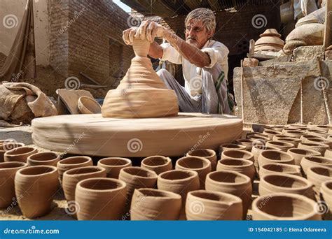 Indian Potter Making Clay Pots on Pottery Wheel in Bikaner. Rajasthan ...