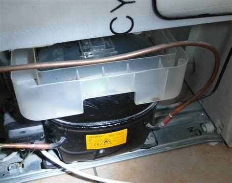 Mastercook LC-27ADX refrigerator how to remove the water container on ...