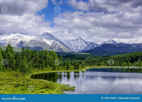 Mountain Landscape, White Clouds, Lake and Mountain Range in the ...