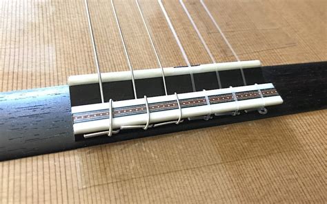 Image result for How to String a Classical Guitar