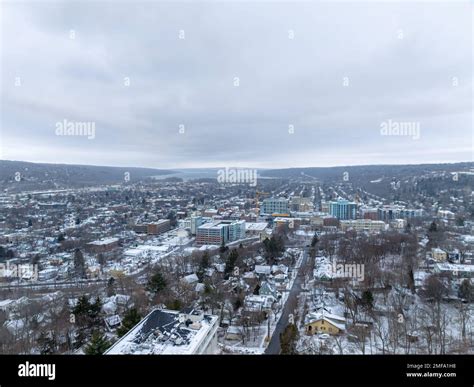 Afternoon winter aerial video of the area surrounding the City of ...