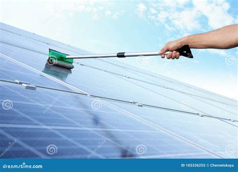 Hand of Worker Washing Solar Panels after Installation Stock Image ...