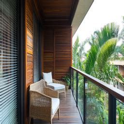Tropical Balcony Design With Turf Grass And Stone Wallpaper