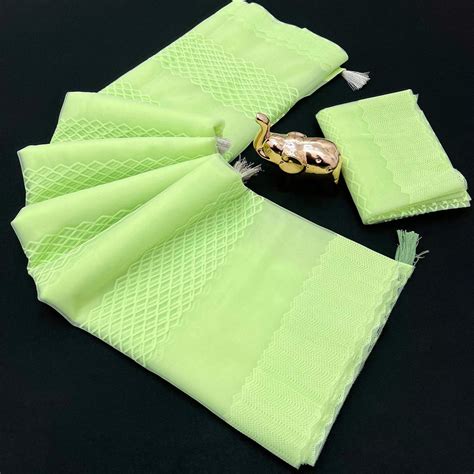 Green Woven Thread Work Net Saree With Tassels