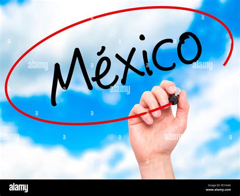 Man Hand writing Mexico (In Spanish) with black marker on visual screen ...