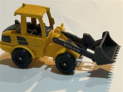 ماکت فلزی ماشین فلزی مایستو ماشین راهسازی «لودر چرخ دار» Maisto Mini ...