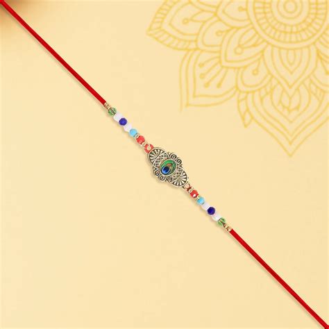 Peacock Feather Design Antique Rakhi with Multicolor Beads – For Broth