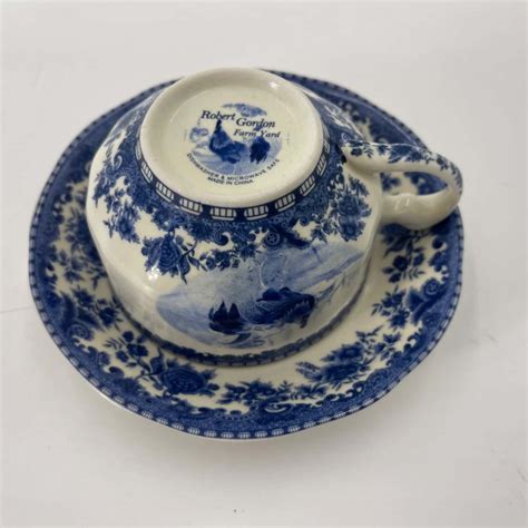 Robert Gordon pottery Farm Yard Blue and White Teacup and saucer set(s)