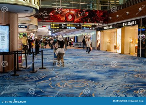 Changi, Singapore - October 24, 2024: Tourists Transiting at Singapore ...