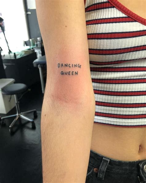 inner arm word tattoos