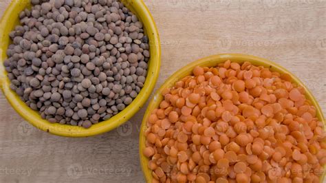 Split Red Lentils and Whole Brown Lentils in Yellow Bowl Top View ...
