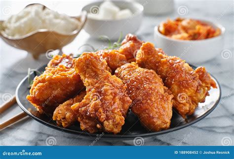 Crispy Fried Korean Chicken Wings in Soy Garlic Sauce with Pickled ...