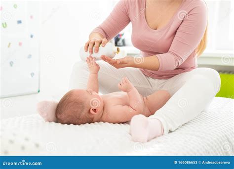 Baby Massage Background. Kids Therapist Applying Massage Oil To Baby ...