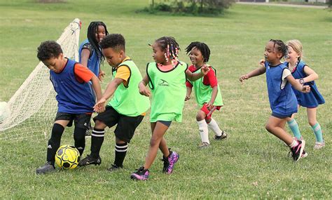 Kids Playing Soccer 的图像结果