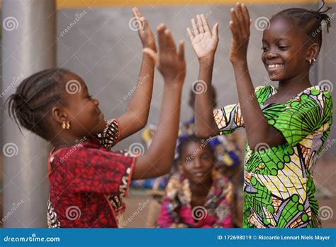 Two Little African Girls Performing a Hand Clapping Game Stock Image ...