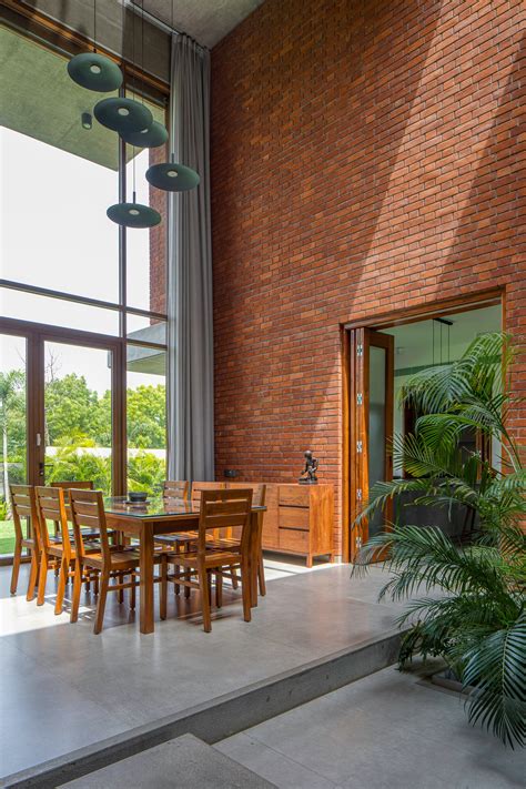This light-filled brick home in Vadodara is designed using vastu ...