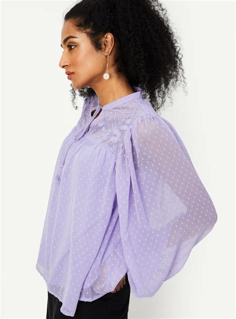 Buy Women Embroidered Tie-Up Neck Top Online at just Rs. 799.0 ...