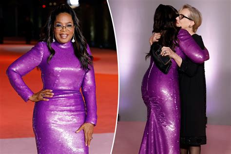 Oprah Winfrey stuns in form-fitting purple gown at the Academy Museum Gala
