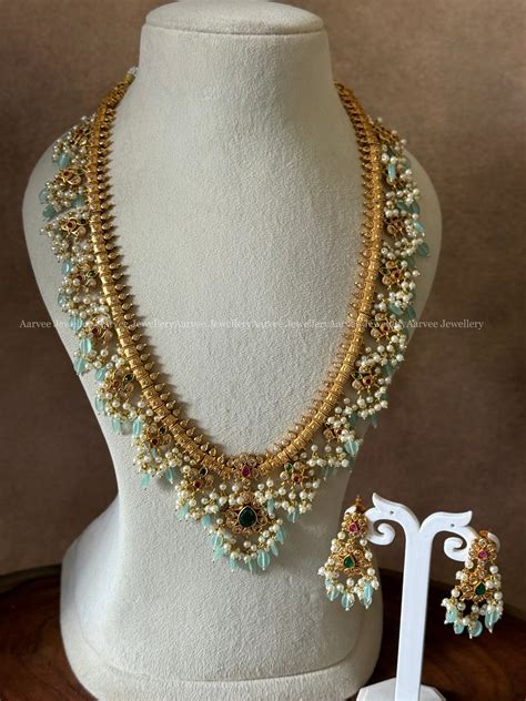 FLORAL GUTTA PUSALU HARAM SET WITH PASTEL BLUE BEADS – AARVEE JEWELLERY
