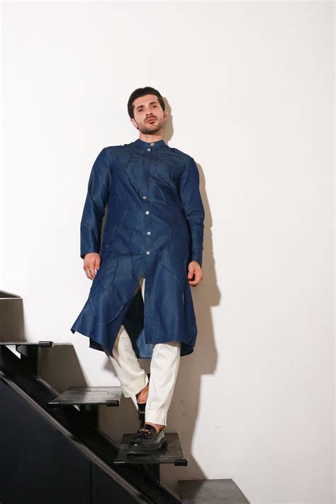 Denim long kurta with self pleating detailing paired with off white na ...