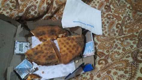 Domino's Pizza — burnt pizza was served