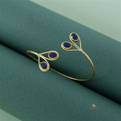 Textured Rinaya Tetra Oval Glossy Bangle – Adore By Priyanka