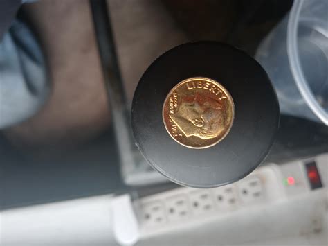 Okay... My friend has this golden plated dime. I personally think is ...