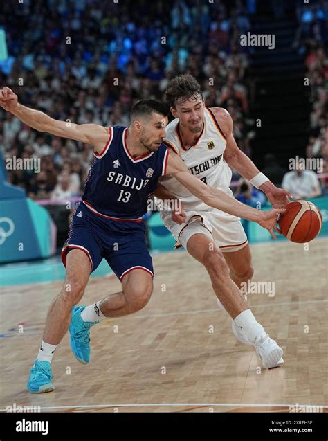 Paris, France. 10th Aug, 2024. Franz Wagner (R) of Germany breaks ...