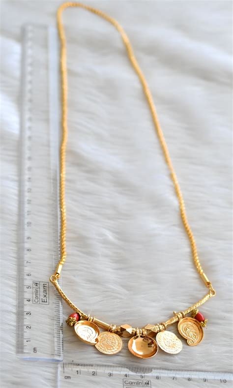 Gold tone 24 inches rope chain with coral mango lakshmi coin bottu man ...