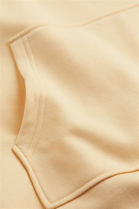 Hooded sweatshirt dress - Light yellow - Ladies | H&M IN