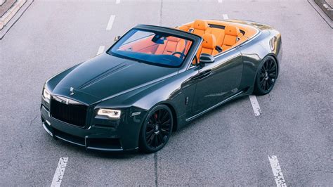 Arguably one of the prettiest convertibles, the Rolls-Royce Dawn has gained a more aggressive ...
