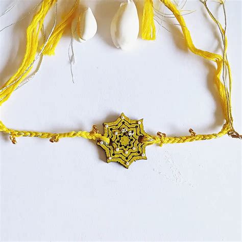 Buy Handmade Yellow Ghungroo Shell & Beads Wooden Lumba Rakhi For ...