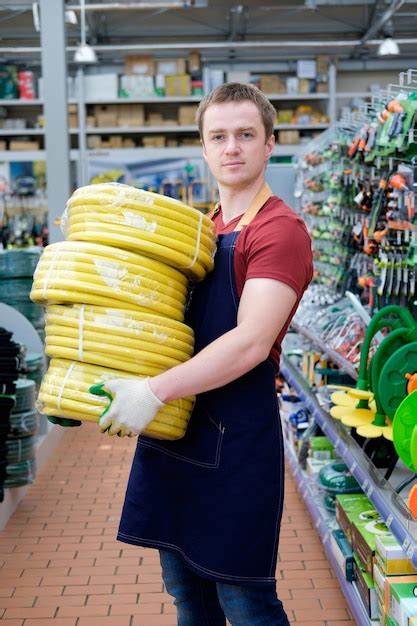 Seller with equipment tools at store | Premium Photo