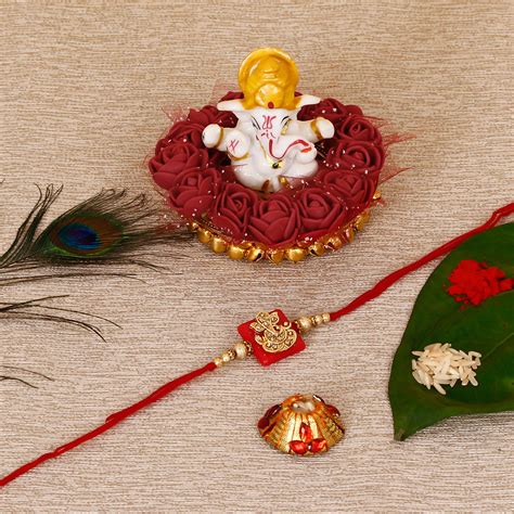 Designer Religious Ganesha Rakhi with Lord Ganesha Idol on Decorative ...