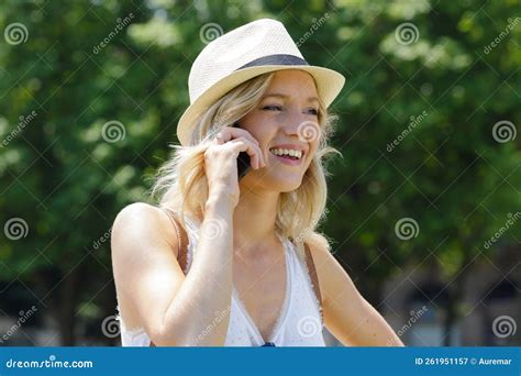 Happy woman talking phone stock image. Image of looking - 261951157