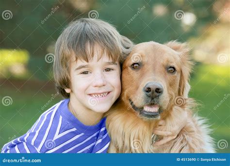 Boy Hugging Dog stock photo. Image of male, hugging, love - 4513690