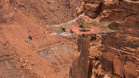 Utah BASE jumper slams into side of mountain, dangles in air after ...