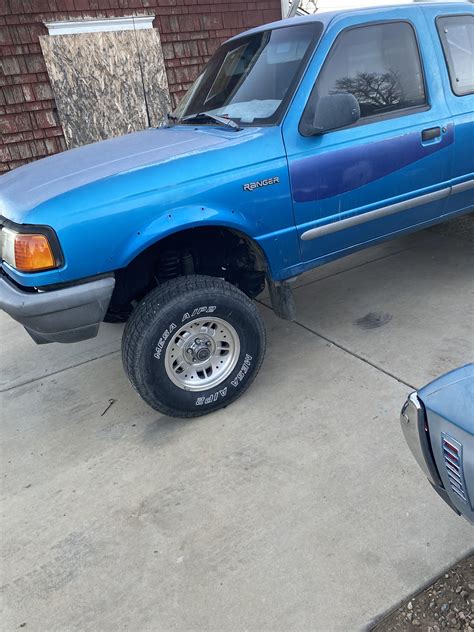 My 93 ford ranger with a 4 inch rough country lift and a 3 inch preformence accessories body ...