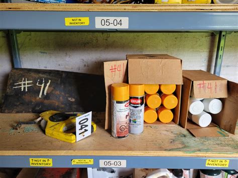 Qty of spray paint, rubber & 100 ft measuring tape
