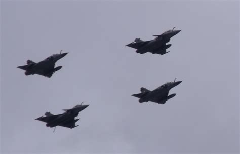 French Rafale And Mirage 2000 Fighter Aircrafts Flying In Formation ...