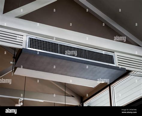 Air conditioning wall mounted ventilation system on ceiling in the ...