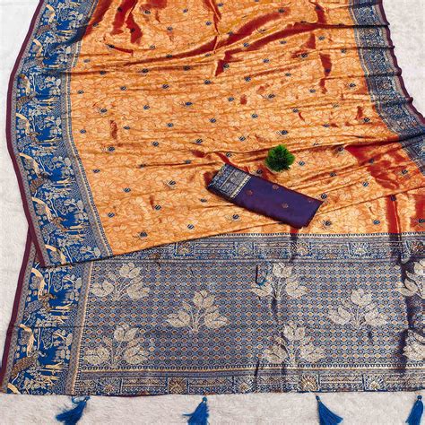 Rusty Orange Silk Blend Saree Featuring Elegant Floral Weaving Work