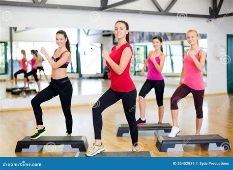 Group of Smiling People Doing Aerobics Stock Image - Image of happy, body: 35402839