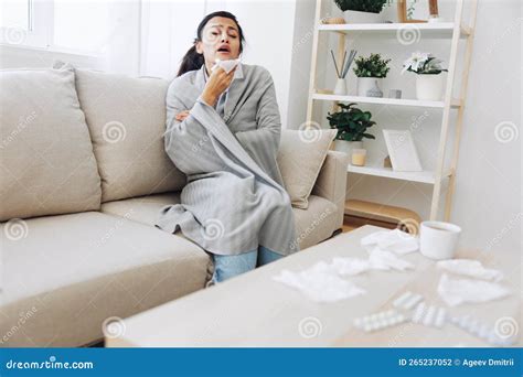 Woman Cold Headache Runny Nose and Stuffy Nose Sitting on Sofa in Plaid, Treatment for Flu ...