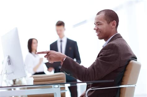 Business Man Pointing at Computer 的图像结果