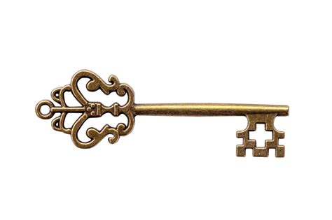 Close-up of key against white background | Premium Photo